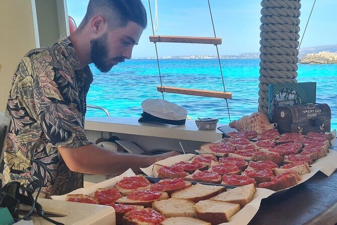 Cruise to White Rocks & Xi Beach with lunch and wine - Stop 1: White Rocks Hotel Kefalonia and the boat-only beach you’ll want to linger at