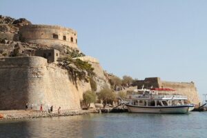 Day Trip to Agios Nikolaos and Spinalonga Island - Your Day at a Glance: Pickup, Town Breaks, Then Spinalonga Island