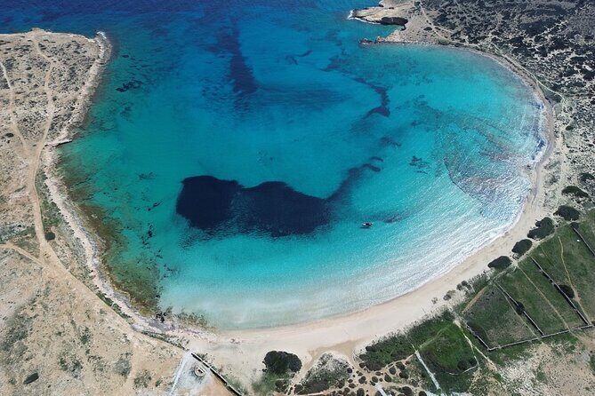Discover Hidden Gems around Paros | Private Boat Tour - Stop 4: Camping Antiparos and the Antiparos-Fera Canal sandbar break