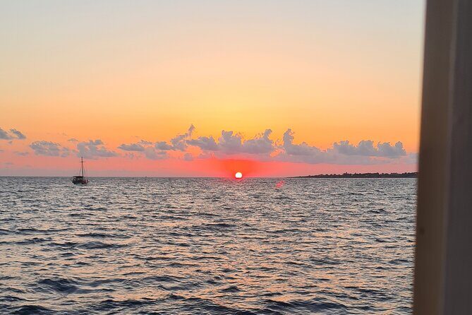 Dreamy Cruise sunset tour with dinner and unlimited wine! - Meeting in Argostoli: Getting on the Boat Without Fuss