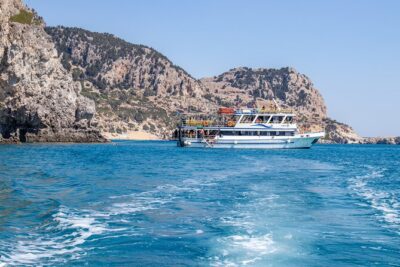 East Coast Bay to Bay Full-Day Boat Trip with Transfers - Anthony Quinn Bay, the calm first stop