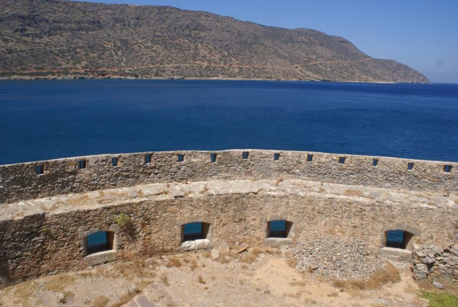 Elounda: Spinalonga Guided Boat Tour with BBQ and Swimming - Ferry to Kolokytha Beach: The First Water Stop