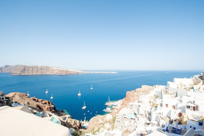 Enjoy the best of Santorini with our Private Tour! - Stop 1: Three Bells of Fira for instant Santorini recognition