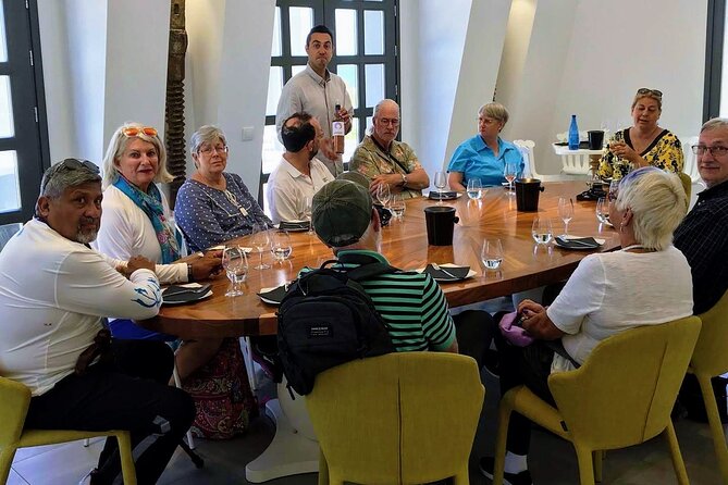 Experience Like a Local Santorini Food and Wine Tasting - Monolithos Beach and a proper Greek dinner