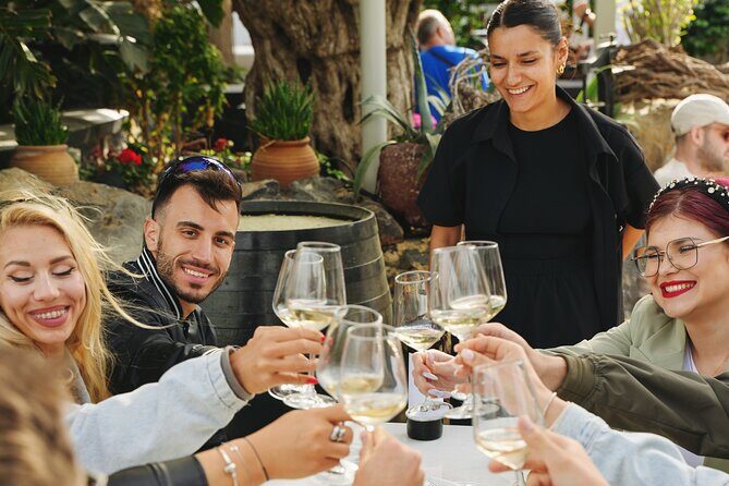 Experience Santorini Award-Winning Wineries with Sunset & snacks. - The Flow of the Day: Art Stop, Winery Stops, Then Sunset at Three Bells