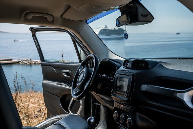 Explore Mykonos with local guide and Jeep Renegade Private Tour - Agios Sostis: sandy, calm, and a rare no-frills beach