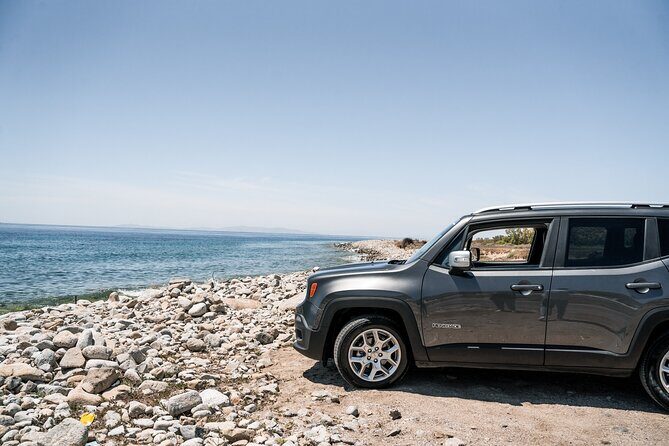 Explore Mykonos with local guide and Jeep Renegade Private Tour - Armenistis Lighthouse in Fanari: the best north-coast photo angle