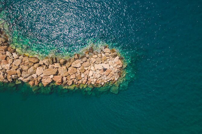 Explore Rina's Cave and Koufonisia Cruise From Naxos - Kato Koufonisi and its calm turquoise water