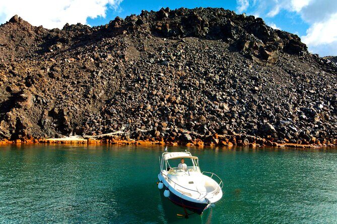 Explore Santorini and its volcanic wonders with Alex Private Boat - Private Boat Life: Your Pace, Your Crew, No Crowd Shuffle