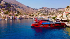 Faliraki: Direct Cruise to Symi & Saint George's Bay - Getting on the boat: Faliraki Sea Lines desk, mini-bus, and parking at Amada Colossos