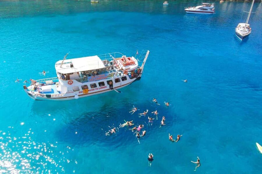 Faliraki: Lindos Boat Cruise with Swim stops & Free Time - Morning Ride: Faliraki Coast Views on the Way to Lindos