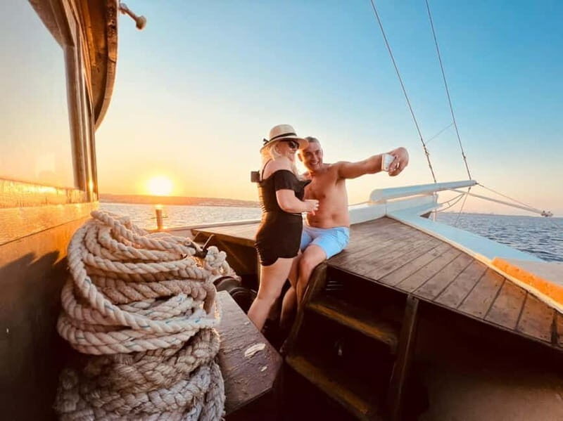 Faliraki: Sunset Cruise with Unlimited Aperol, Beers & Wine - Boarding a Comfortable Boat and Getting Settled