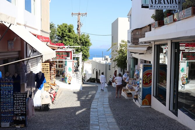 Fira Walking Tour: Explore Top Sights & Hidden Gems - Two Catholic churches and a quieter side of town