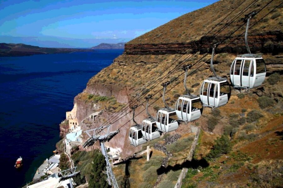 Fira: Walking Tour with Cable Car Ride - Pelican Kipos wine cellar: local pours, optional tasting