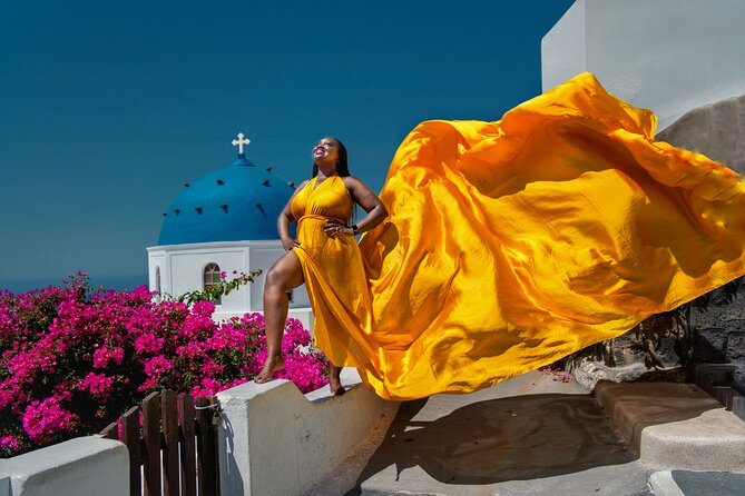 Flying Dress Photoshoot in Oia Private entry to Blue Dome - Why the Blue Dome setting works