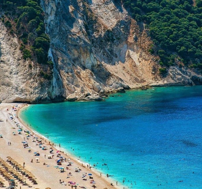 From Argostoli: Melissani Lake and Myrtos Beach Tour - Melissani Lake boat ride: the glow inside the cave