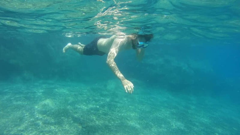From Faliraki : Speedboat tour kalithea caves&antony kouin - Captain stories: marine ecosystems, coastal geology, and local history