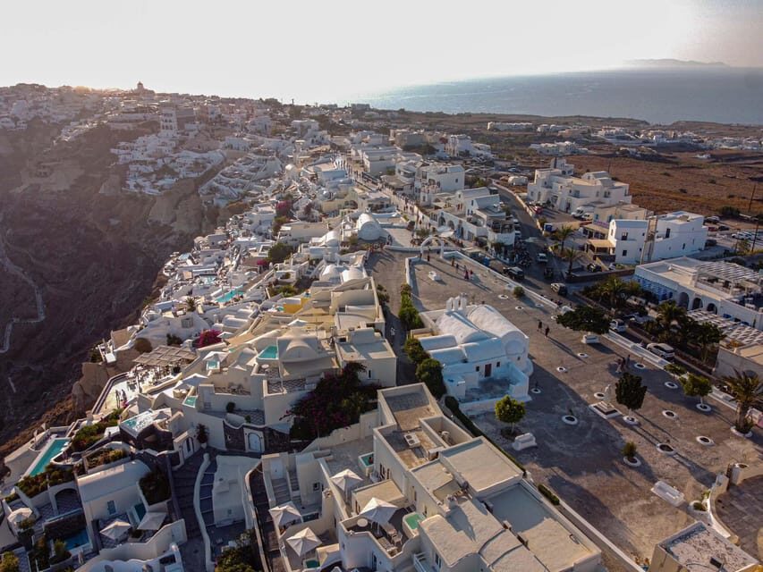 From Fira: Santorini Highlights Minibus Tour with Oia Sunset - Downsides to plan around: a long day, variable stop time, and bus A/C