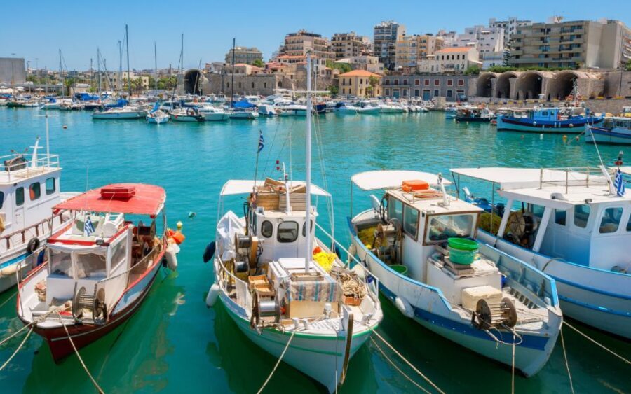 From Heraklion: Knossos Palace Guided Tour & Heraklion City - The full day flow: pickup windows, bus rides, and how pacing feels