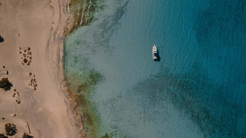 From Ierapetra: Chrissi Island Yacht Cruise with Lunch - Chrissi Island Setup: Cedar Forest, Dunes, and Beach Time in One Pass