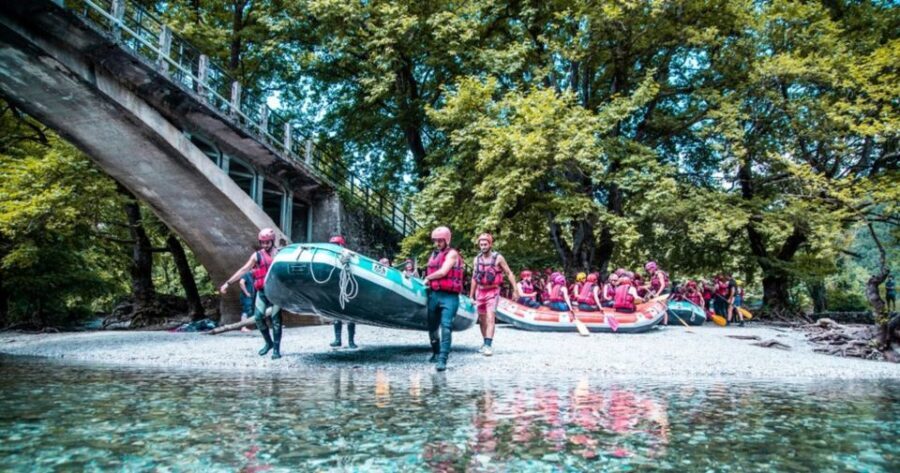 From Kleidonia: Voidomatis River Rafting Adventure - Sliding through clear, cold water under plane trees