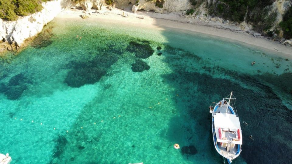 From Lefkimmi: Boat Trip to Sivota & Blue Lagoon - Greek music keeps the seven-hour cruise social