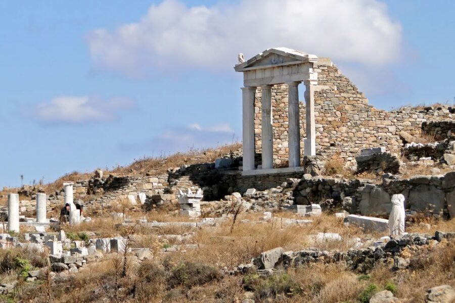 From Mykonos: Delos Archaeological Site Guided Evening Tour - Theater of Delos and the walk toward the market-and-sanctuary zone