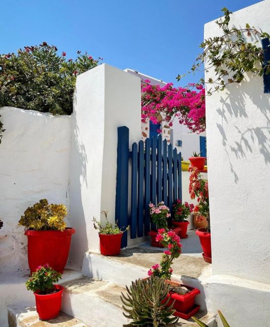 From Naxos: Iraklia and Koufonissia Full-Day Boat Trip - Arriving in Koufonissia by the white windmill