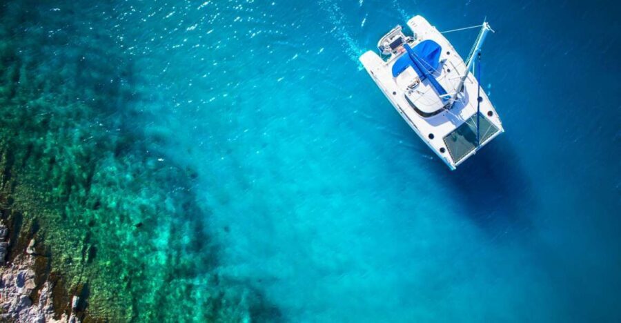 From Ornos: Mykonos Delos Catamaran Cruise with Meal & SUP - Delos from the water: photos, not a museum day