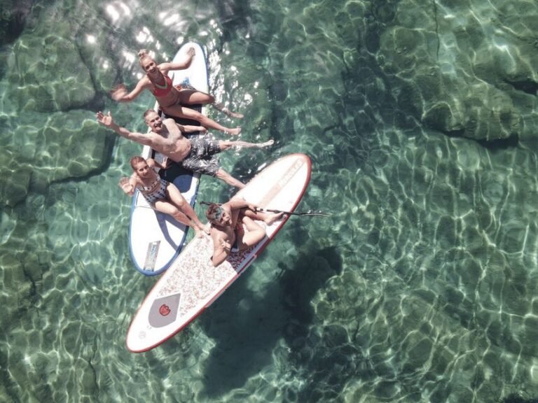 From Ornos: Mykonos Delos Catamaran Cruise with Meal & SUP - Getting aboard: crew-led, small-group energy