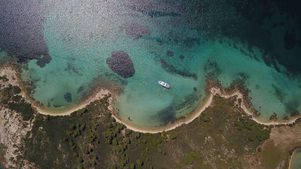 From Ouranoupoli: Blue Lagoon Two Island Cruise - Banana Beach is the relaxed final stop