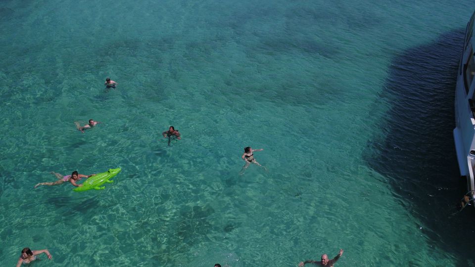 From Ouranoupoli: Blue Lagoon Two Island Cruise - Lunch, shade, music, and the practical beach details