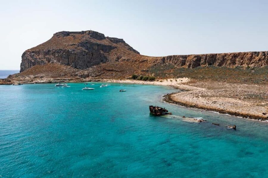 From Rethymno: Balos Lagoon, Gramvousa Peninsula with PickUp - Balos Lagoon beach time: shallow water, classic views, and the right expectations
