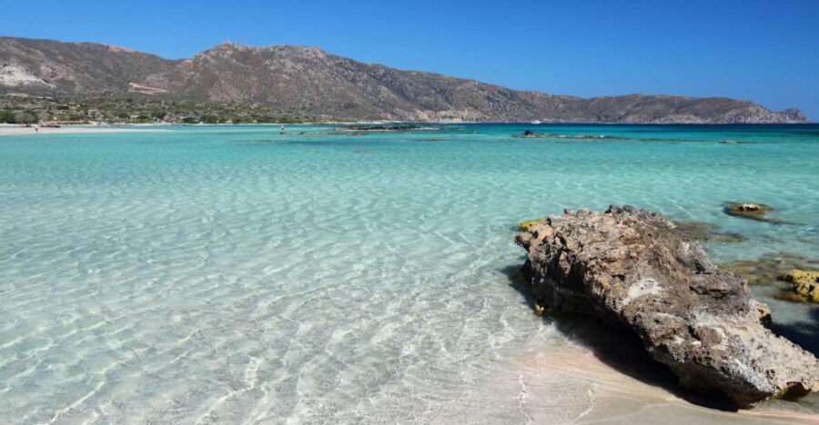 From Rethymno: Elafonisi Beach Guided Tour with Pick-Up - Arriving at Elafonisi: pink sand, clear water, and a short walk