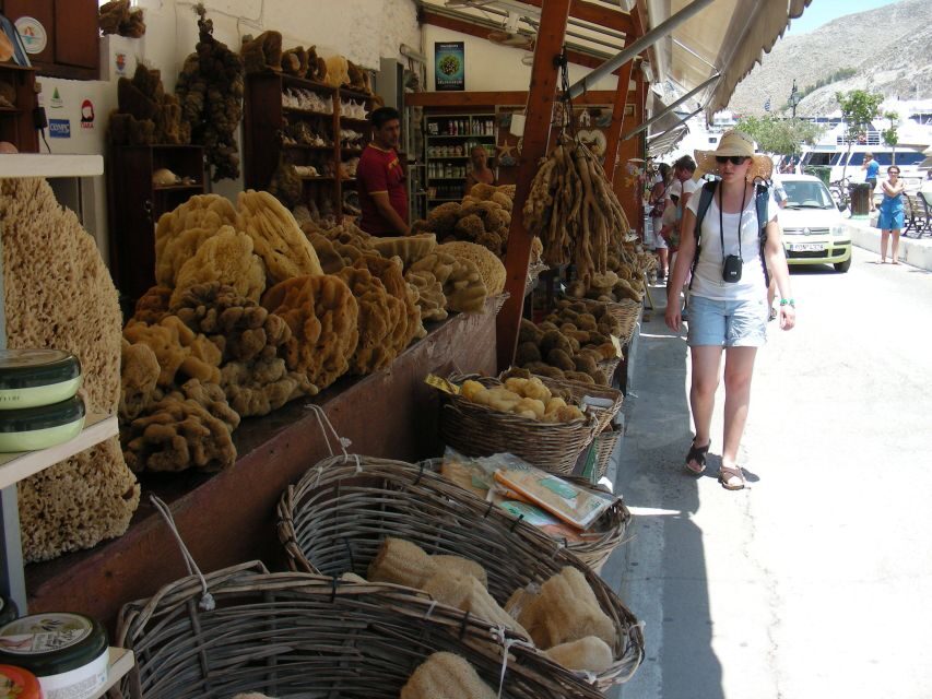 From Rhodes: Boat Trip to Symi Island with Hotel Transfer - Symi Town on Foot: Pastel Color, Painted Boats, and Coastal Life