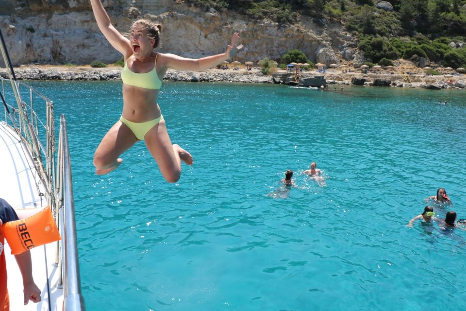 From Rhodes: Private Catamaran Cruise All Inclusive - Anthony Quinn Bay: rocky coves and clear water