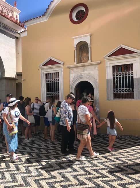 From Rhodes: Symi Island and Panormitis Monastery Day Trip - Panormitis Port: Museum time and a drink by the water