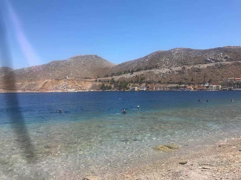 From Rhodes: Symi Island and Panormitis Monastery Day Trip - Symi town: colorful houses, sponge traditions, and the best harbor photo points