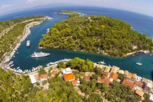 Full-Day Boat Tour of Paxos Antipaxos Blue Caves from Corfu - How Corfu Town, the fort, and Kanoni look from the boat