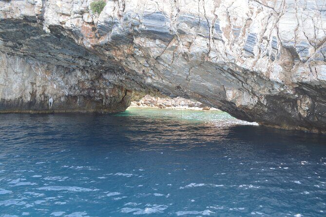 Full Day Catamaran Cruise in Paros - Stop 5: Antiparos Simadoura rocky coast and small sea caves