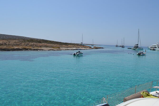 Full Day Catamaran Cruise in Paros - Stop 1: Antiparos Blue Lagoon (Panterinosia) for clear-water swimming
