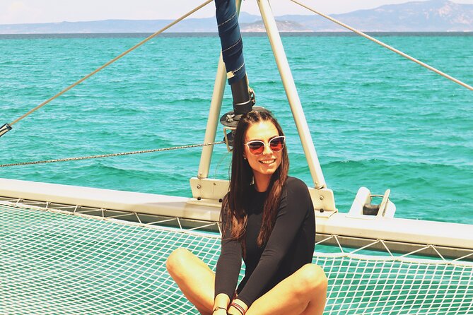 Full Day Santorini Catamaran Private Cruise with meal and transfer - Palea Kameni: dark volcanic shores inside the caldera