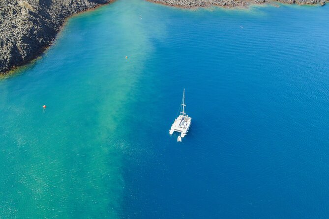 Full Day Santorini Catamaran Private Cruise with meal and transfer - Nea Kameni and the hot springs