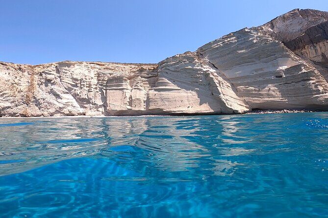 Glaraki Private Day Cruise - Faneromeni Bay swim stop: fruit, a quick reset, then back to Paros