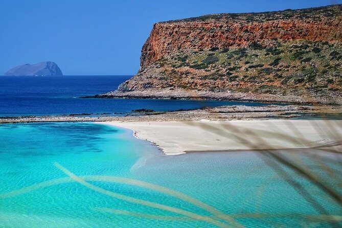 Gramvousa and Balos Tour from Chania(Boat ticket is included!) - Gramvousa Island and pirate views: castle hike energy, shoreline rules, and St. George candles