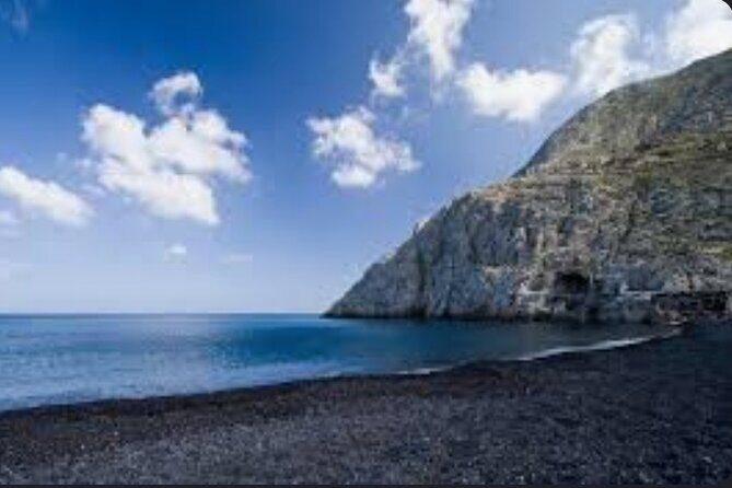 GreekAmerican guide Themistoklis to tour beautiful Santorini. - Oia viewpoints: the iconic blue-and-white moment, but with better timing