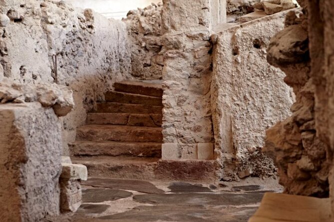 Guided Tour to the Akrotiri Archaeological Site in Santorini - The large building with fourteen rooms per floor