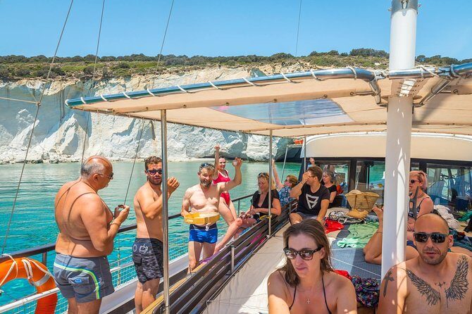 Half Day Boat Tour to Kleftiko Milos - The Gerontas Bay swim stop: easy water time first