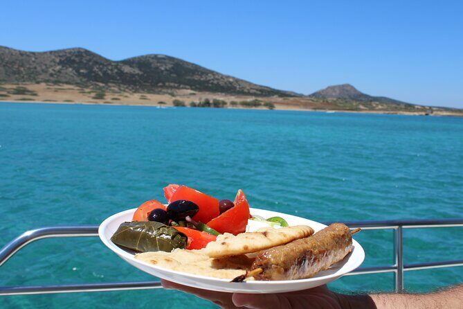 Half Day Cruise Explore Paros Antiparos and Despotiko - Stop 2 at Epitafios Beach: Peaceful Caves, Swim-Through Views