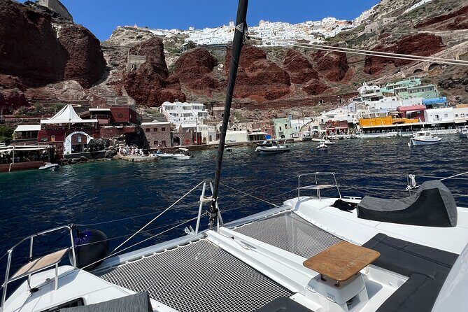 Half-Day Tailor-made Private Catamaran Cruise in Santorini - Red Beach and volcanic cliffs: the stop that sets the tone